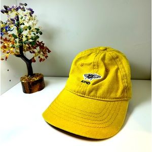 Cute kind woman’s yellow hat with adjustable strap.